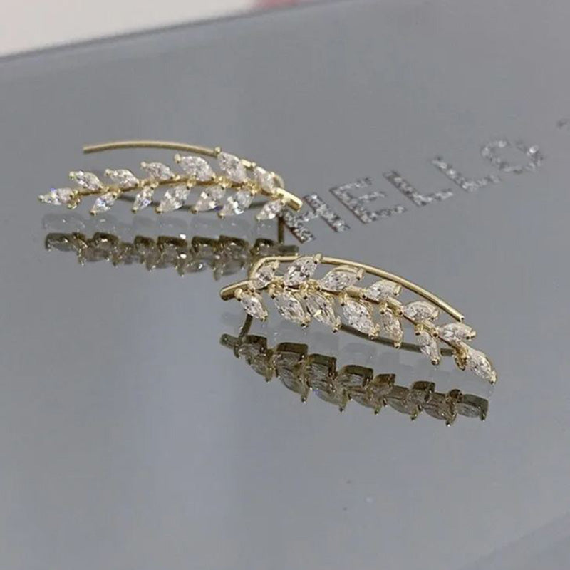 Arenzza elegant leaf stud earrings made of jewelry accessories, featuring delicate leaf designs in a refined style.
