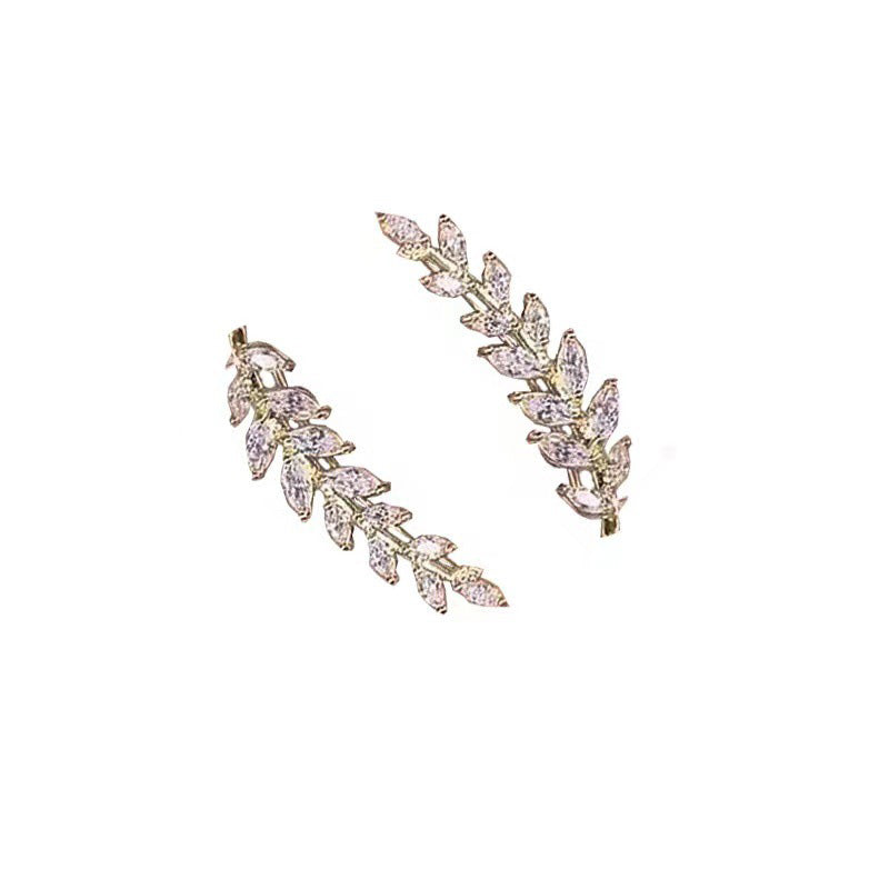 A pair of elegant leaf-shaped stud earrings by Arenzza, featuring intricate jewelry accessories with a refined leaf design.