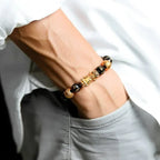 Arenzza FengShui bracelet for wealth and happiness, jewelry accessory featuring green and gold beads with charm accents.