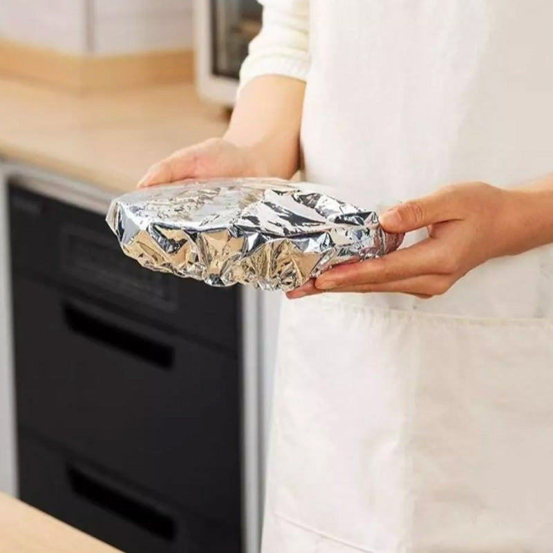 Arenzza aluminum foil insulation cover for kitchen use, shown in a roll with shiny silver surface and heat-resistant material.