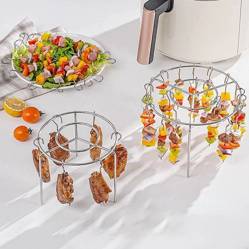 Arenzza kitchen air fryer kebab grill with free heat-resistant anti-scald gloves, showcasing the grill and gloves in a kitchen setting.