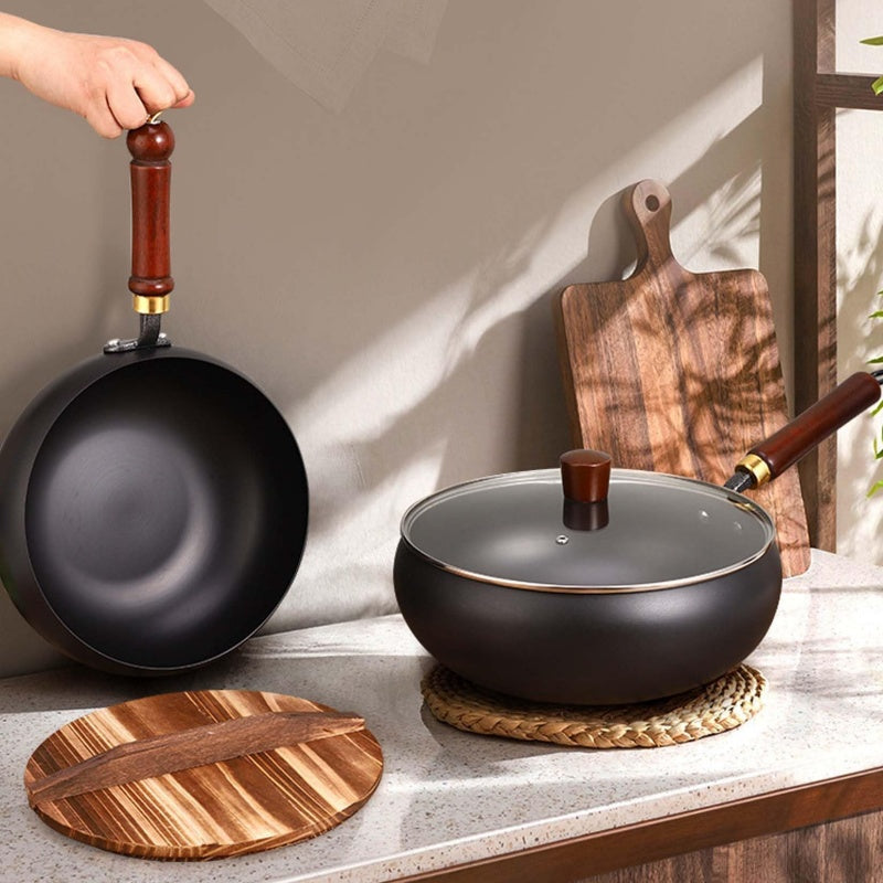 Arenzza uncoated thick iron kitchen pot with lid, showcasing a sturdy, rustic cookware piece ideal for versatile cooking.
