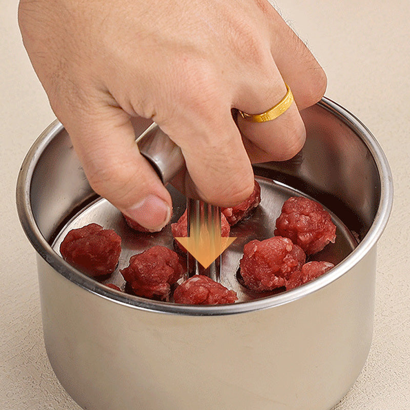 Aarenza stainless steel meatball mould for kitchen use, showing multiple round meatballs formed in the mould.