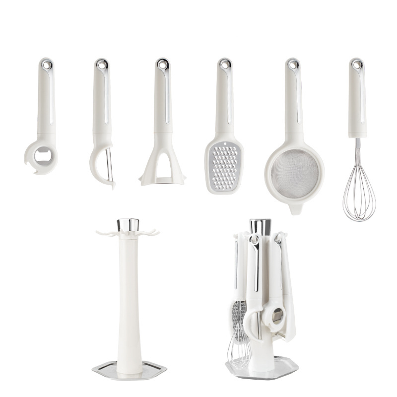 Arenzza 7-piece kitchen gadget set with spatulas, tongs, and tools, displayed on a white background for versatile cooking use.