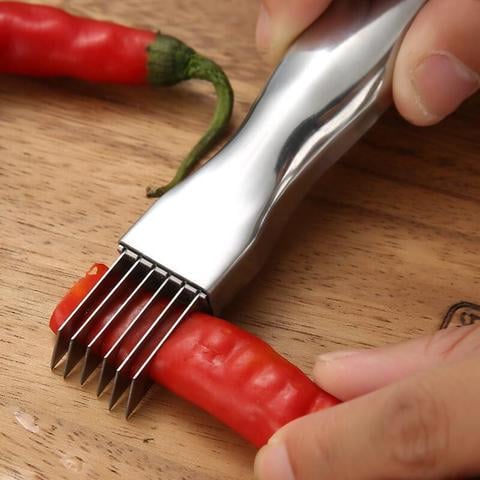 Arenzza Shred Silk The Knife kitchen tool with a sleek design, shown in a close-up image highlighting its sharp blade and handle.