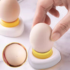 Arenzza kitchen egg piercer with safety lock, stainless steel design, ready to pierce eggs for cooking or baking.