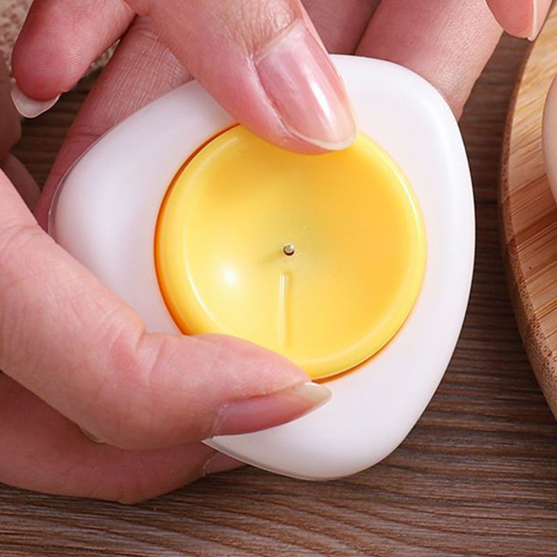 Arenzza egg piercer with safety lock shown in a kitchen setting, featuring a stainless steel design and ergonomic handle.