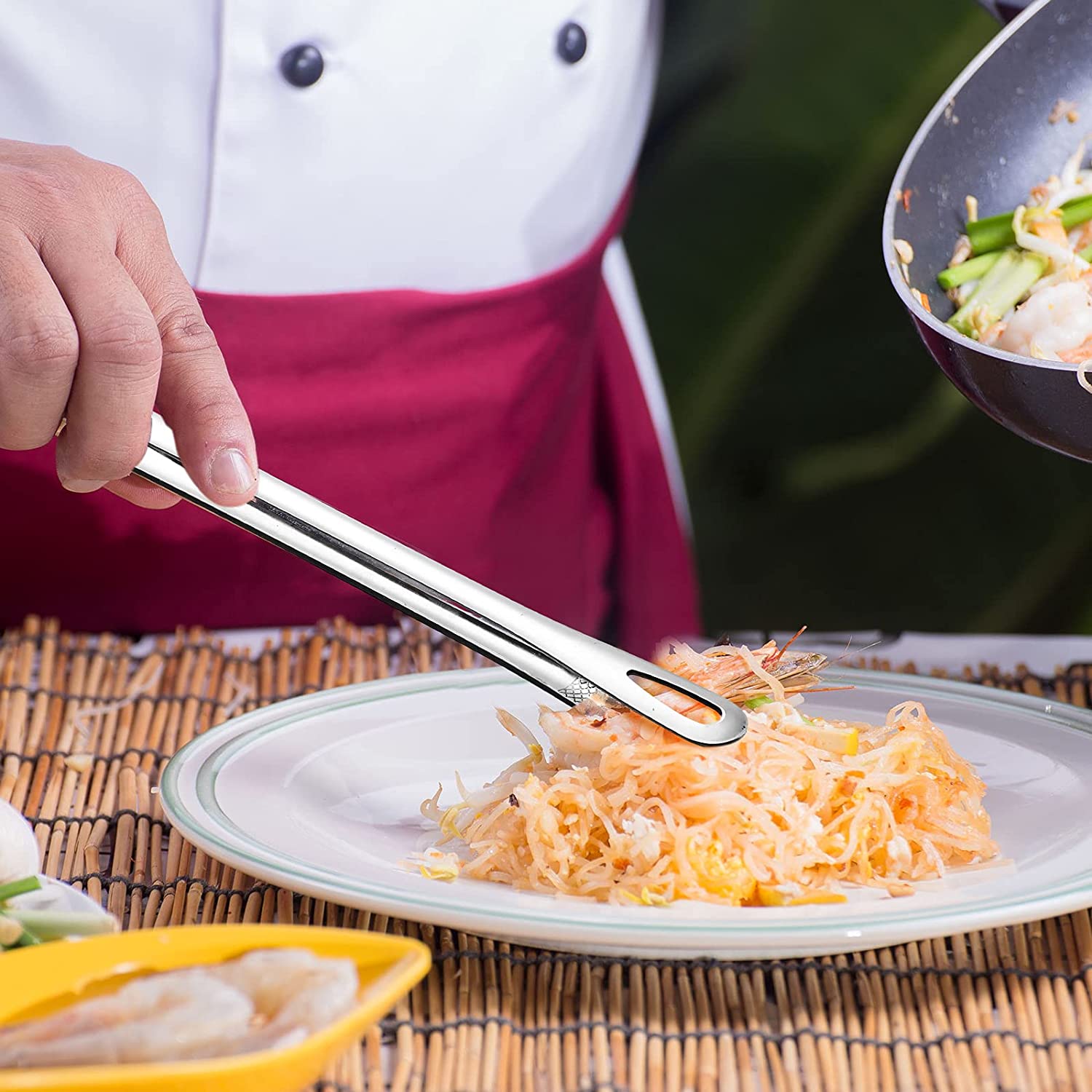Arenzza stainless steel barbecue tongs with a black handle, perfect for grilling and kitchen use.