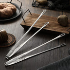 Arenzza stainless steel barbecue tongs with a durable grip, ideal for grilling and outdoor cooking in a kitchen setting.