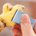 Arenzza sharp and portable ginger peeler with ergonomic handle and stainless steel blade for efficient kitchen ginger peeling.