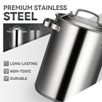 Aarenza stainless steel asparagus and pasta pan with handles, filled with cooked pasta and fresh asparagus, on a kitchen countertop.