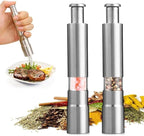 Arenzza professional grade salt, pepper, and spice grinder with refillable glass chambers on a kitchen countertop.