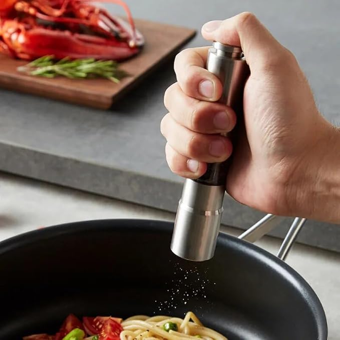 Arenzza professional kitchen salt, pepper, and spice grinder with refillable glass chambers and adjustable grind settings.