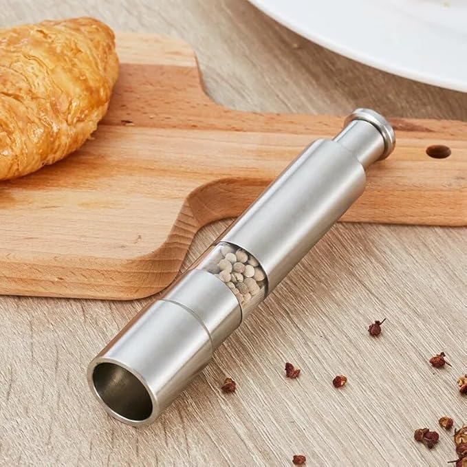 Arenzza professional kitchen salt, pepper, and spice grinder with refillable glass chambers, ready for seasoning.