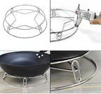 Round stainless steel Arenzza kitchen steamer rack for steaming and cooking, with a mesh design and sturdy construction.