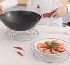 Aarenza round stainless steel kitchen steamer rack for steaming vegetables and dishes in cookware.