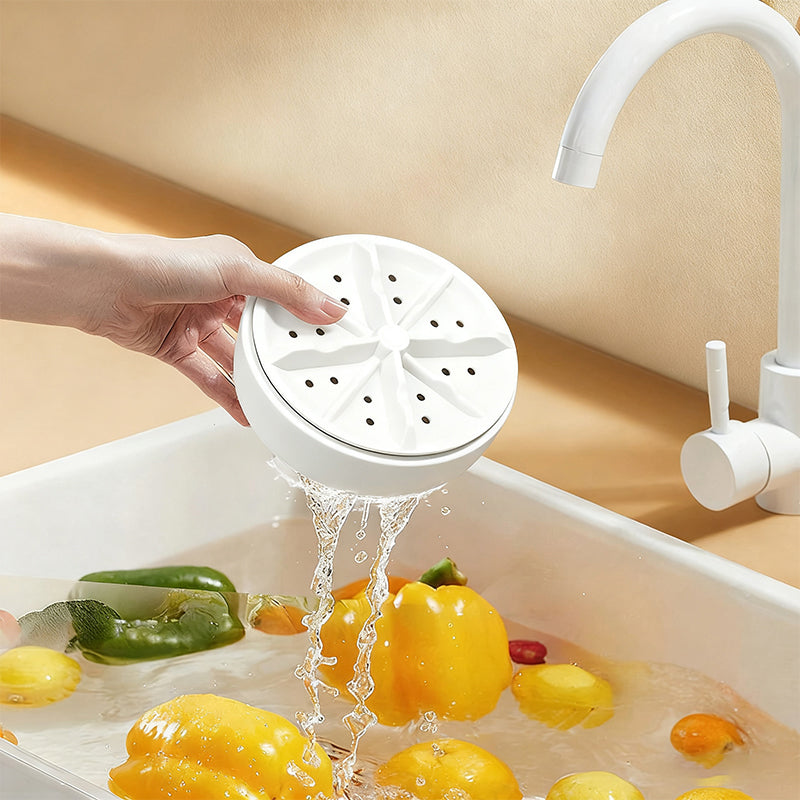 Arenzza vortex fruit and vegetable washer in a kitchen setting, showing the device with fresh produce ready for cleaning.