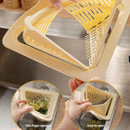 Arenzza magnetic suction space-saving corner sink strainer in a kitchen, featuring a black, compact, and easy-to-use design.