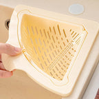 Arenzza magnetic suction space-saving corner sink strainer in a kitchen, designed to catch debris and fit snugly in the corner sink.