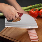 Arenzza ergonomic kitchen knife with front-handle design, ideal for cutting vegetables and meat in a home kitchen setting.