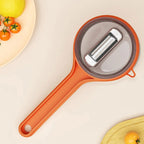 Arenzza multifunctional kitchen peeler with debris storage bucket, showcasing its ergonomic handle and sharp peeling blade.