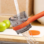 Arenzza multifunctional kitchen peeler with debris storage bucket, showing the peelers and the storage container in use.