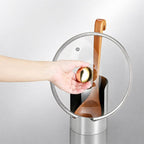 Arenzza multi-functional kitchen utensil holder with multiple compartments for storing spoons, spatulas, and cooking tools in a modern kitchen.