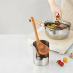Arenzza multi-functional kitchen utensil holder with compartments for spoons, spatulas, and cooking tools on a kitchen countertop.