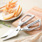 Arenzza professional kitchen shears with stainless steel blades and ergonomic handles, displayed on a kitchen countertop.