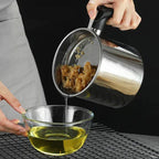 Arenzza stainless steel kitchen oil jar with a sleek, modern design, perfect for storing cooking oils in the kitchen.