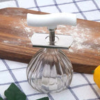 Arenzza Effortless Arthritis Jar Opener in kitchen setting, showing its easy grip handle designed for arthritis-friendly jar opening.
