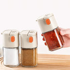Arenzza multifunctional kitchen salt and seasoning dispenser with adjustable nozzle and clear container for precise seasoning.