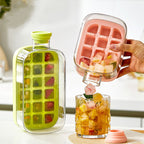 Arenzza press-to-cold ice cube mold and kettle set for kitchen use, with the mold showing stacked ice cubes and the kettle nearby.