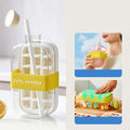 Arenzza kitchen press-to-cold ice cube mold and kettle set with clear silicone mold and stainless steel kettle on a white background.