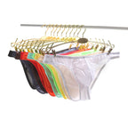 Men's Arenzza ultra-thin transparent low-rise underwear, showing sleek, lightweight fabric and minimal coverage in a close-up shot.