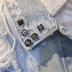 A close-up of Arenzza MetalSnap premium metal buttons showcasing their sleek, metallic finish and designer-style detailing.