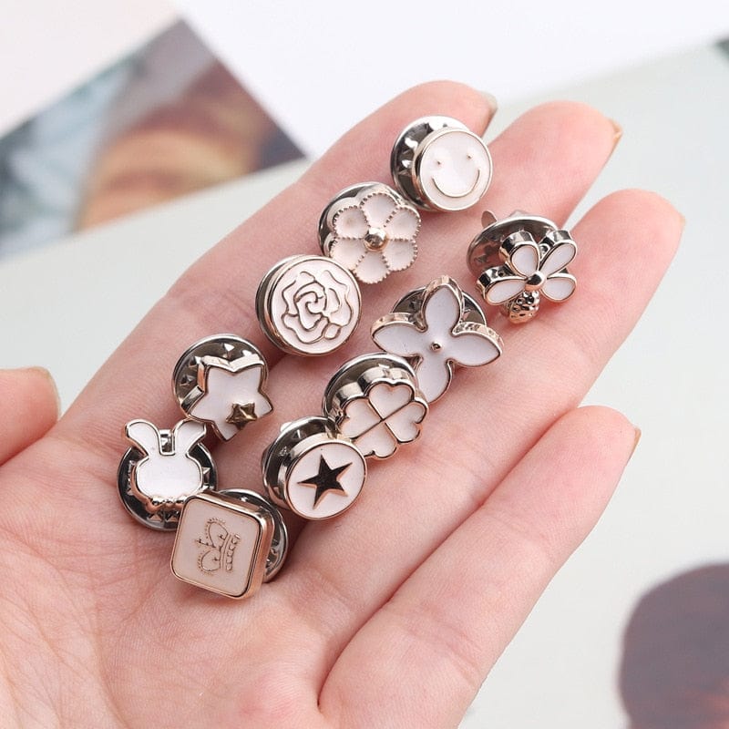 A collection of Arenzza MetalSnap premium metal buttons with a sleek, designer style finish, arranged on a white background.