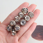 A close-up of Arenzza MetalSnap premium metal buttons with a sleek, designer style finish on a neutral background.