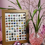 A collection of natural ore gemstone specimens from Arenzza, showcasing various colorful mineral and crystal formations.