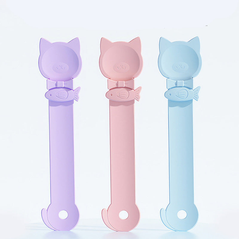 Arenzza Cat Treat Squeeze Feeder Spoon, pet supplies tool for easy treat dispensing, shown with a cat treat in the image.
