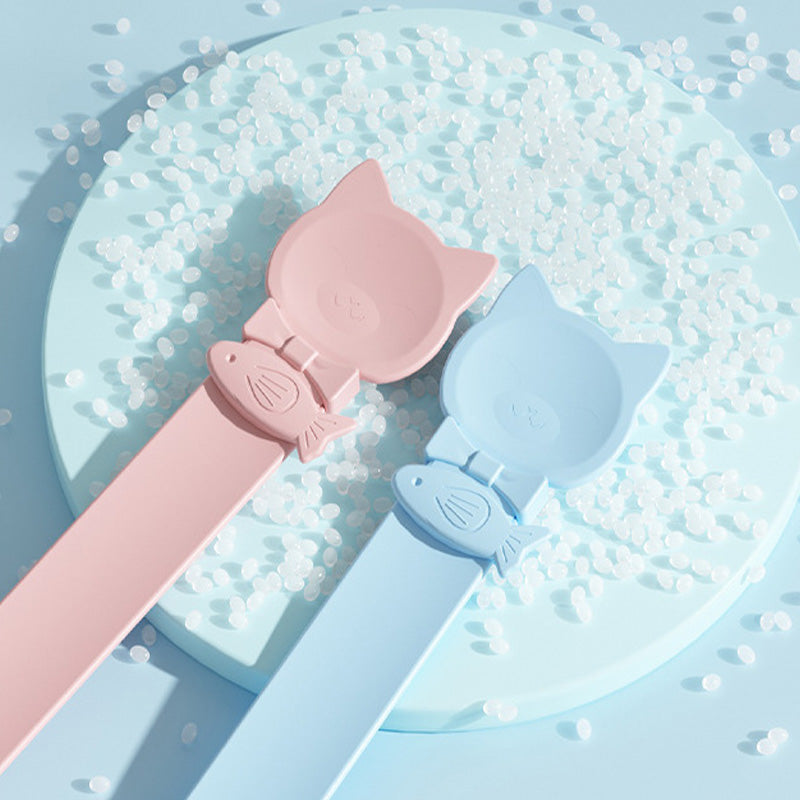 Arenzza Cat Treat Squeeze Feeder Spoon for pet supplies, showing a flexible silicone spoon with treats ready for feeding.