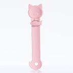 Arenzza Cat Treat Squeeze Feeder Spoon shown with a cat treat, designed for easy feeding and dispensing treats to cats.