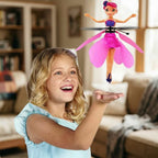 Arenzza MagicFly™ interactive flying fairy toy in a child's hands, demonstrating its lightweight design and magical features.