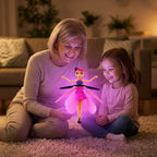 Aarenza MagicFly™ interactive flying fairy toy hovering above a child's hand in a playful outdoor setting.