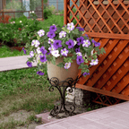 Weatherproof Arenzza artificial petunias in a vibrant floral display, showcasing realistic, colorful, and durable faux flowers.
