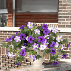 Colorful artificial petunias by Arenzza in a weatherproof floral display, showcasing vibrant, realistic flowers perfect for outdoor decor.
