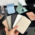 Aarenza Selleasy portable foldable makeup mirror with a compact design, reflecting a clear, close-up view of the mirror surface.