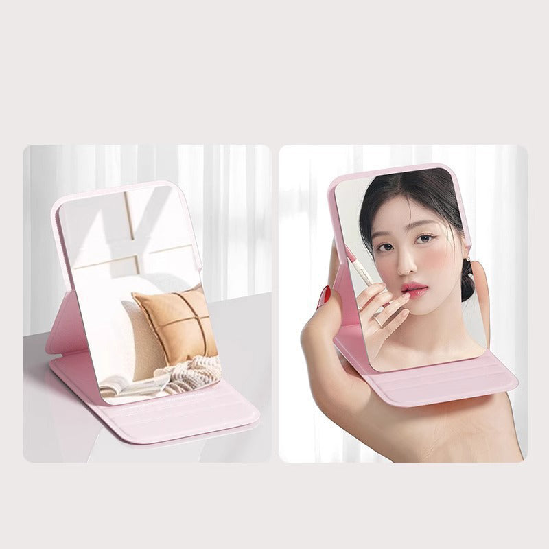 Aarenza Selleasy portable foldable makeup mirror with a sleek compact design, featuring a reflective surface and foldable stand.