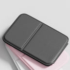 A portable foldable Selleasy Arenzza makeup mirror with a compact design, reflecting a clear, close-up view of the mirror surface.