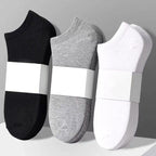 Set of three pairs of Arenzza breathable cotton blend athletic socks by Selleasy, shown in various colors on a flat surface.